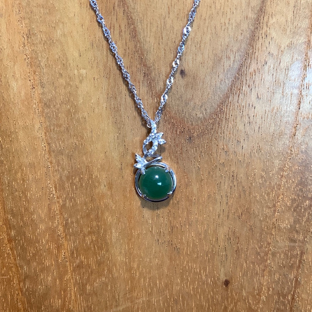 Jade round pendant set in sterling silver
