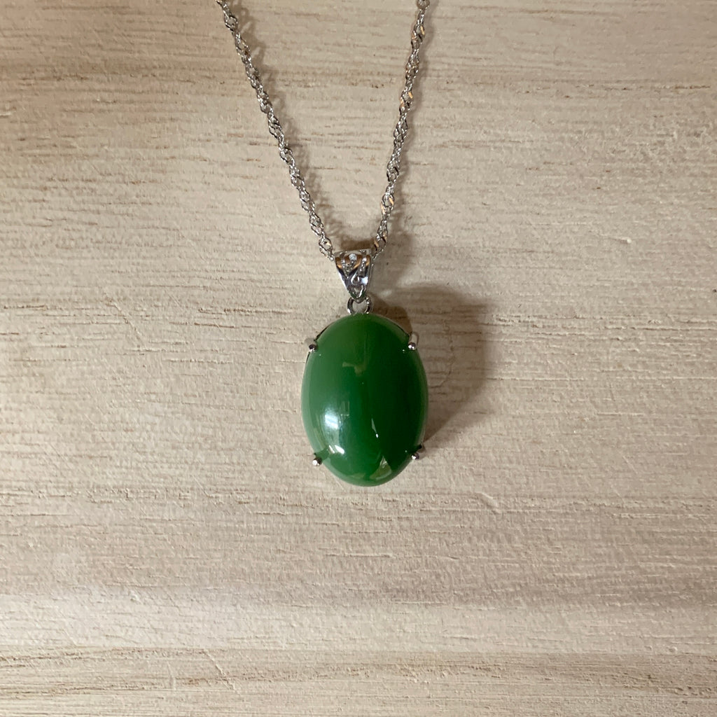 Jade Oval "Cats eye" set in sterling silver, necklace