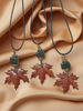 Orange Maple Leaf Pendant with a Jade Bead