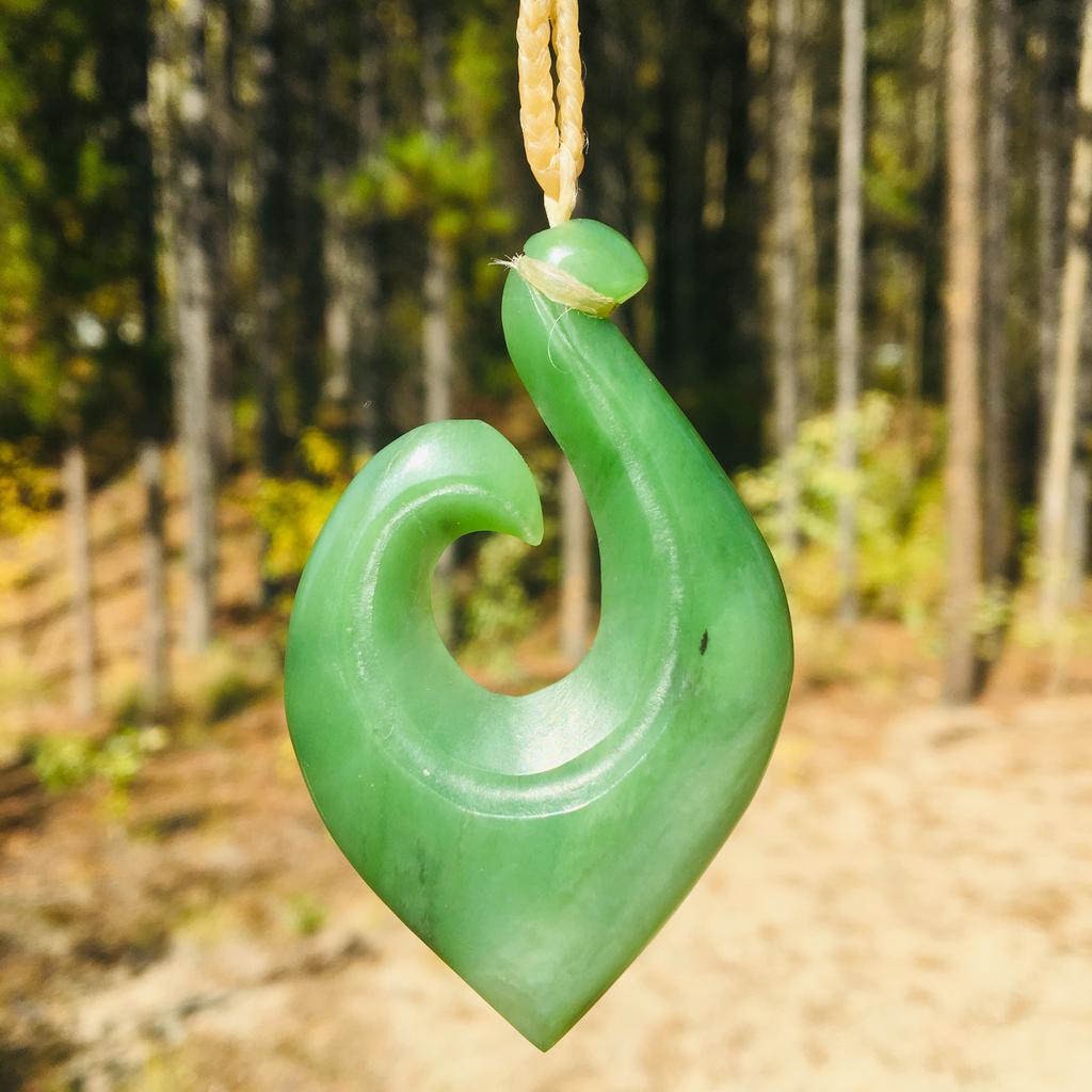 Maori Design - Traditional Maori Hei Matau (fish hook) pendant, hand carved in Jade City