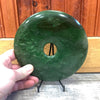 Jade Coin on a Stand